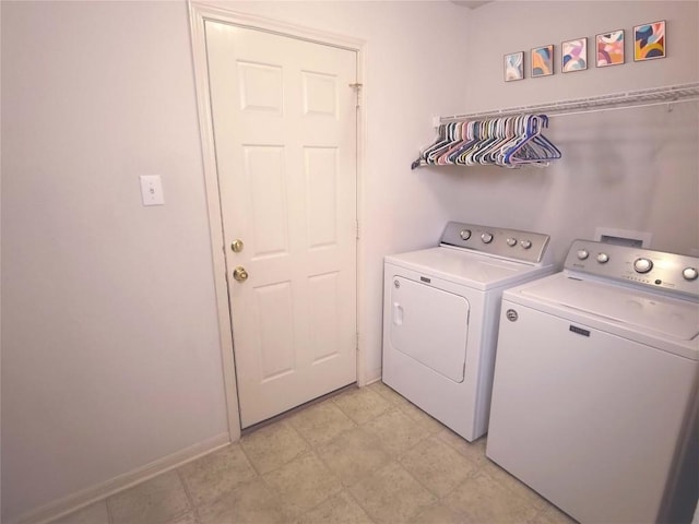 laundry room with separate washer and dryer