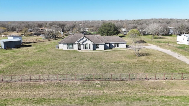 birds eye view of property featuring a rural view