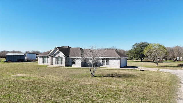 view of front of house with a front lawn