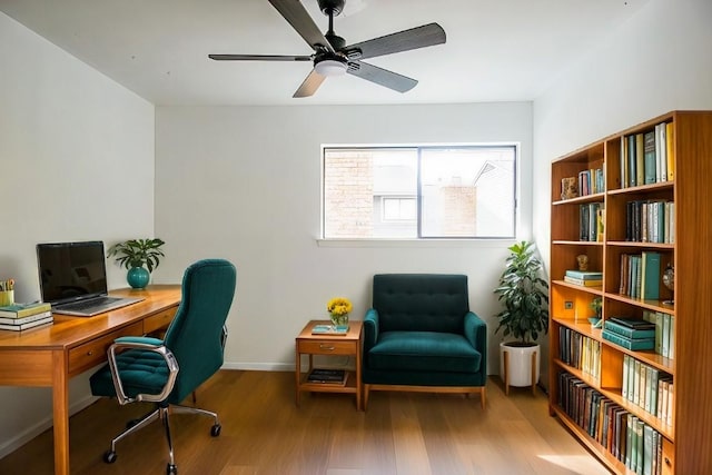 office area featuring hardwood / wood-style flooring and ceiling fan