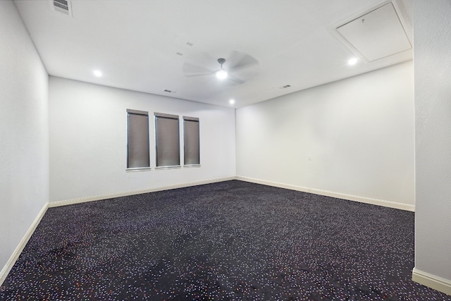 empty room with ceiling fan and carpet floors