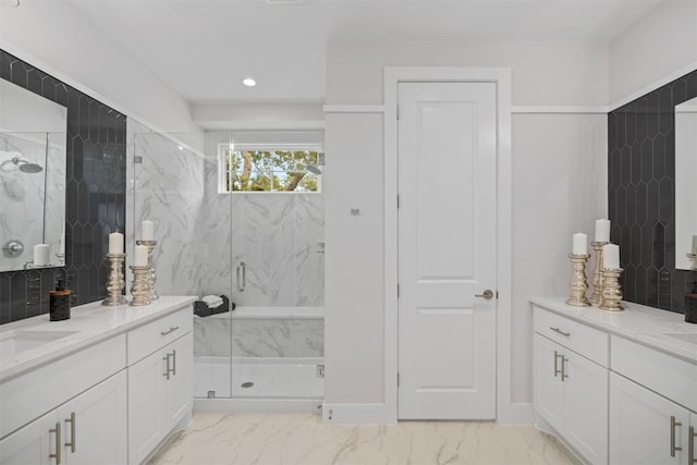 bathroom with vanity and an enclosed shower