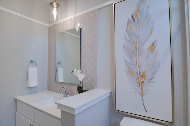 bathroom with vanity and backsplash