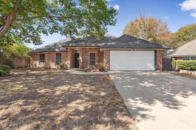 ranch-style house featuring a garage