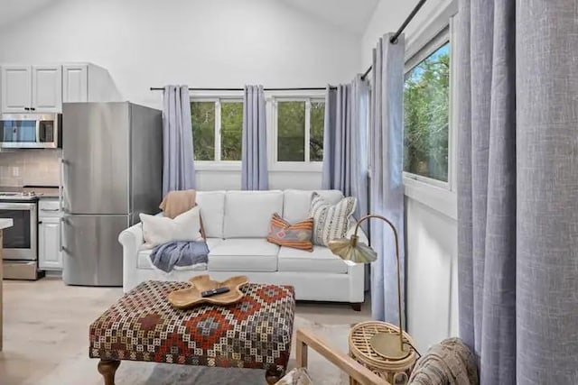 interior space featuring vaulted ceiling