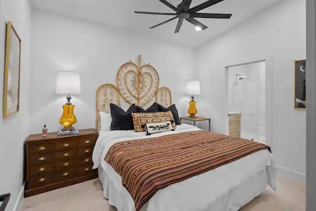 bedroom featuring ceiling fan and connected bathroom