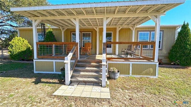 exterior space featuring a front yard and a porch