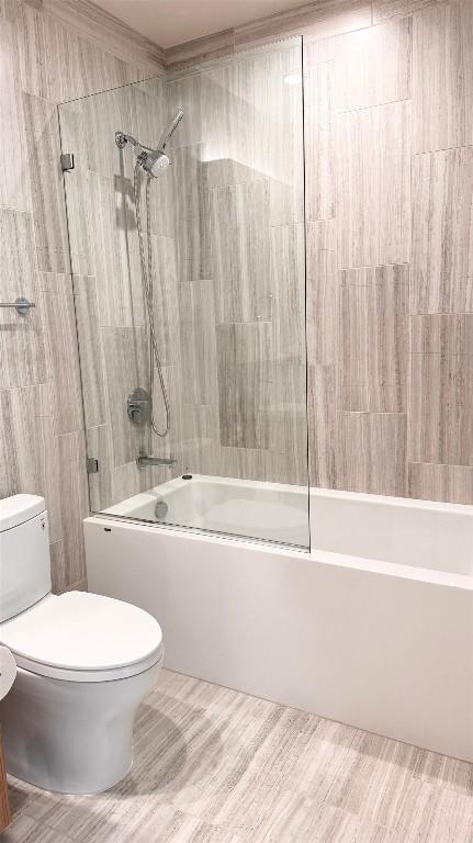 44 E Ave Unit 2808, Austin, TX 78701 - full bathroom with toilet and shower / bathtub combination