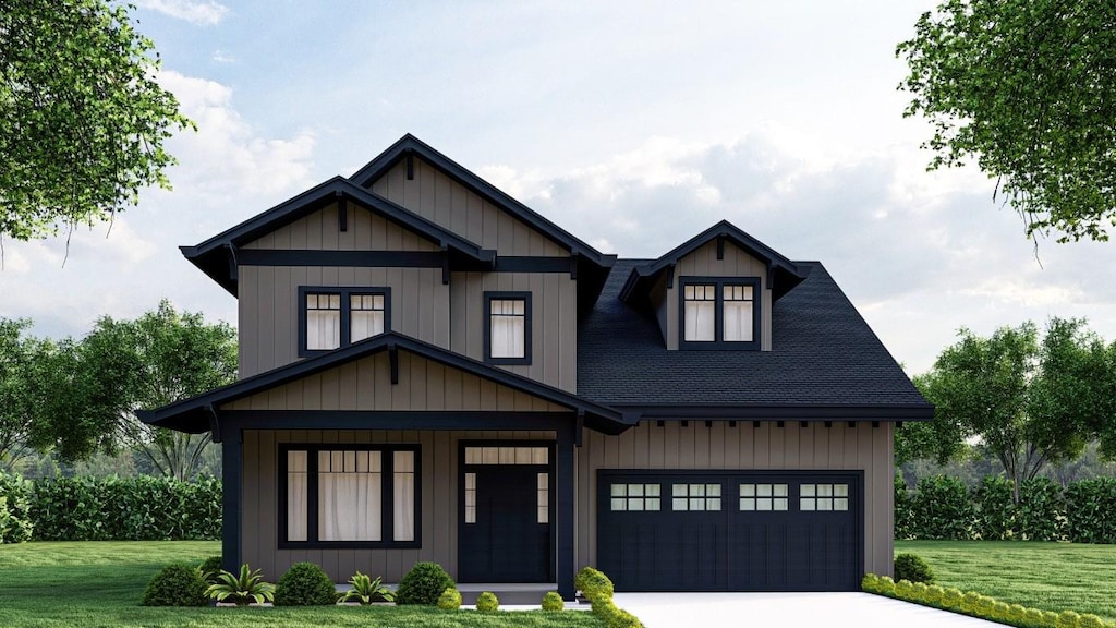 view of front facade with a garage and a front lawn