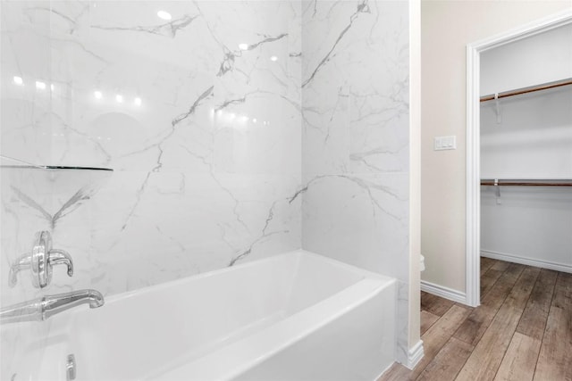 bathroom with hardwood / wood-style flooring