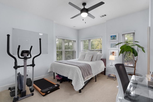 carpeted bedroom with ceiling fan