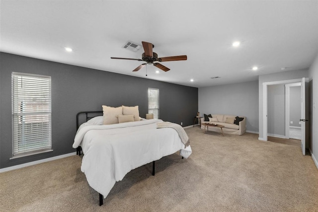 carpeted bedroom with ceiling fan