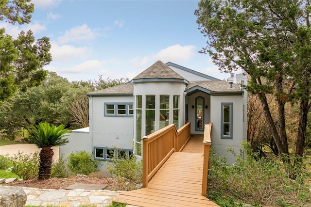 210 Finn St, Austin, TX 78734 - view of front of house with stucco siding and roof with shingles