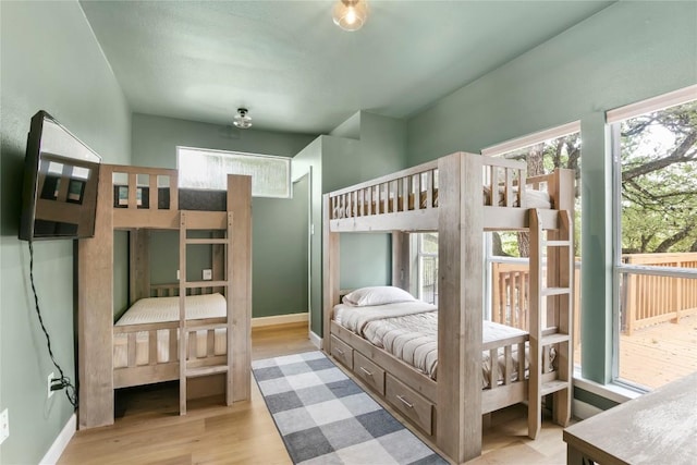 bedroom with light hardwood / wood-style flooring