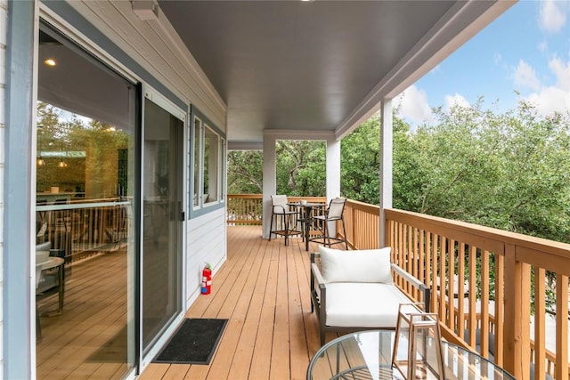 210 Finn St, Austin, TX 78734 - wooden deck with outdoor dining area