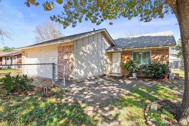 view of front of home featuring a garage