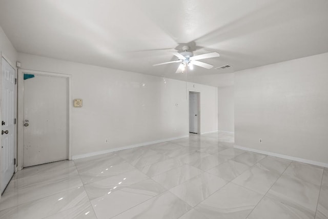 empty room featuring ceiling fan