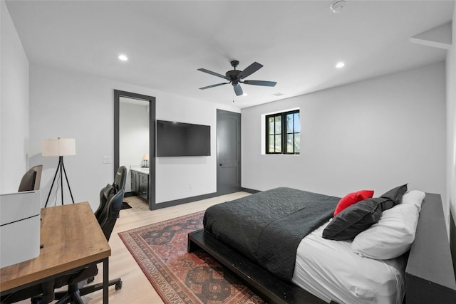 bedroom featuring ceiling fan and light hardwood / wood-style flooring