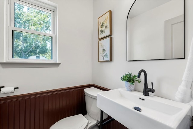 bathroom with sink and toilet