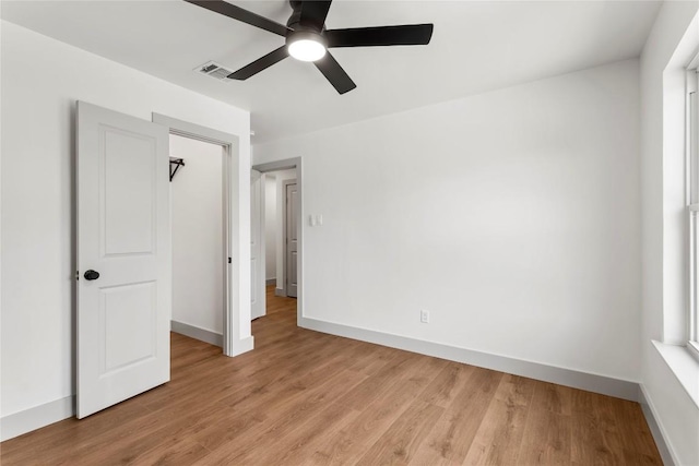 unfurnished bedroom featuring ceiling fan and light hardwood / wood-style floors