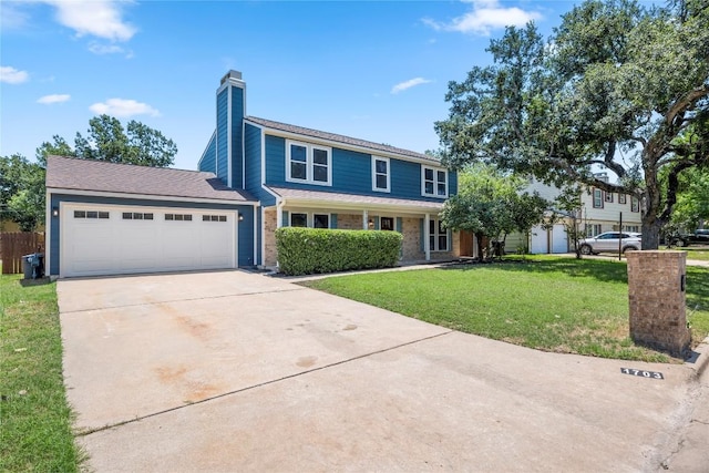 view of front facade featuring a garage and a front yard