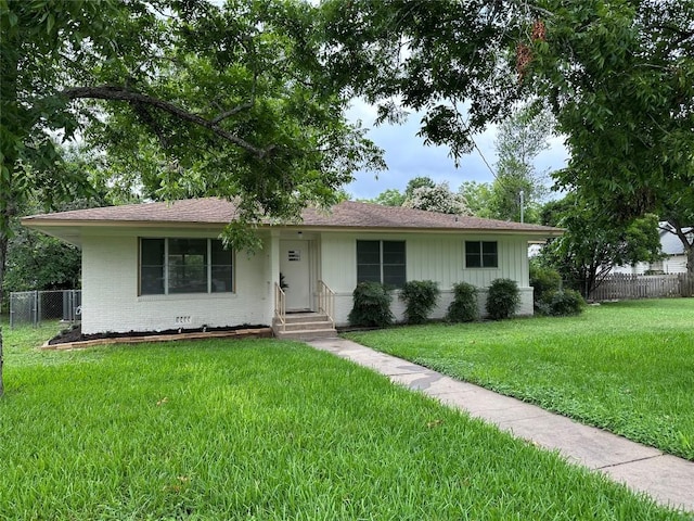 ranch-style house with a front yard