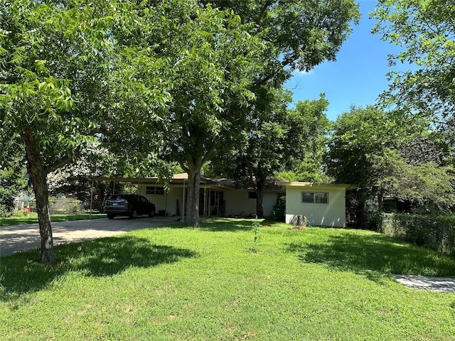 view of yard with a carport