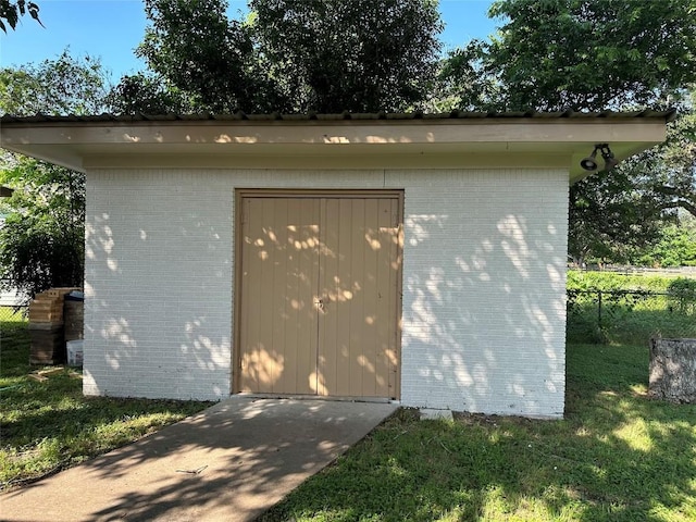 garage with a yard