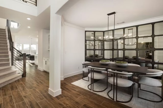 dining area with an inviting chandelier