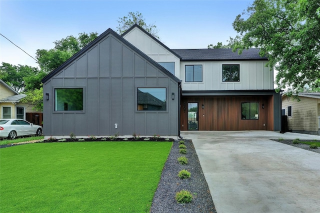 modern farmhouse featuring a front lawn