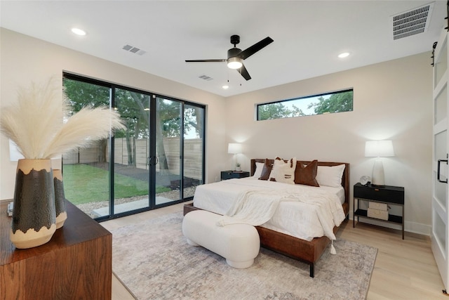 bedroom with ceiling fan, access to outside, and light hardwood / wood-style flooring