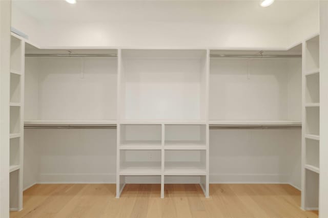 walk in closet featuring hardwood / wood-style floors