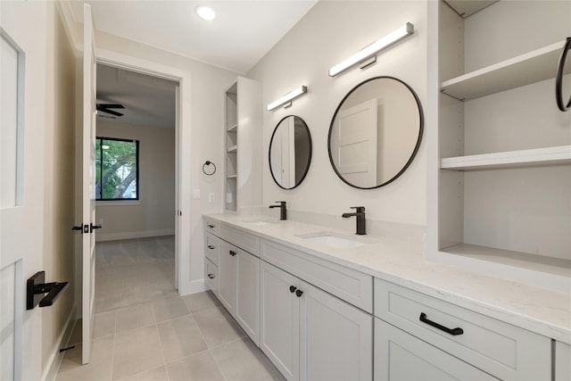 bathroom featuring vanity, tile patterned floors, and ceiling fan