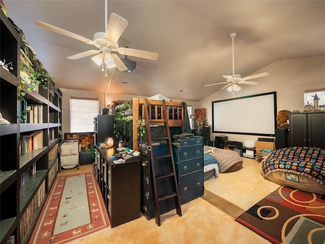 interior space with ceiling fan and vaulted ceiling