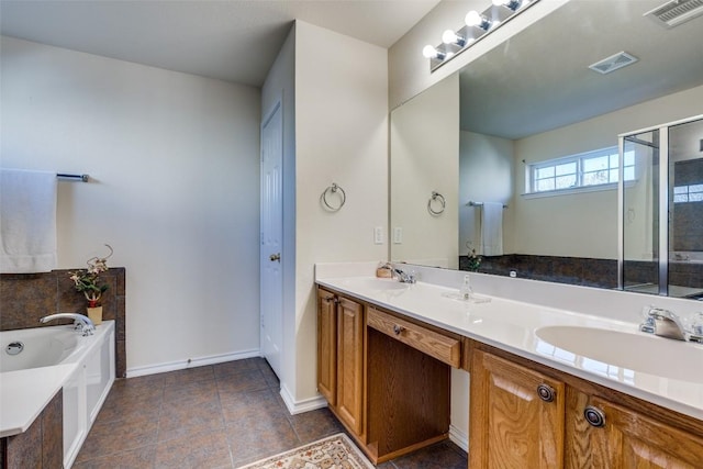 bathroom featuring vanity and a tub