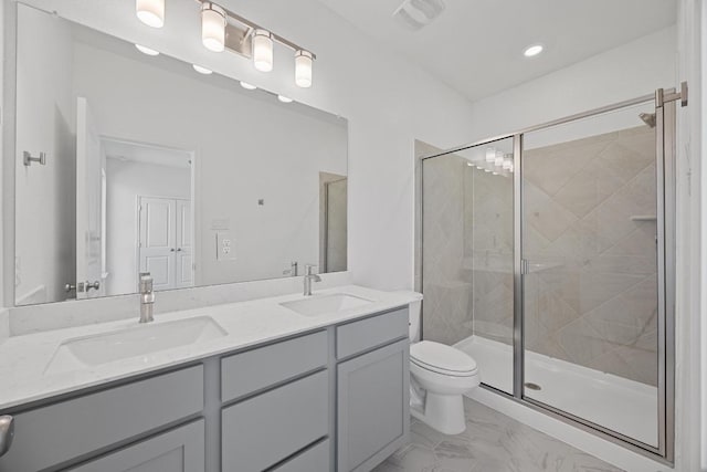 bathroom featuring a stall shower, marble finish floor, visible vents, and a sink