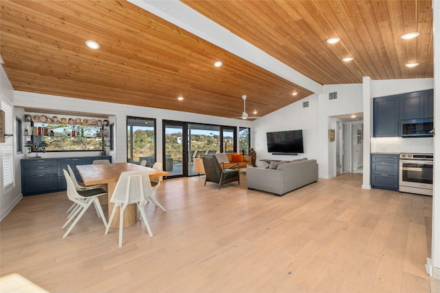 dining area with light hardwood / wood-style flooring, wood ceiling, and vaulted ceiling