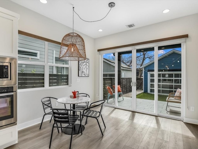 dining area featuring light hardwood / wood-style floors