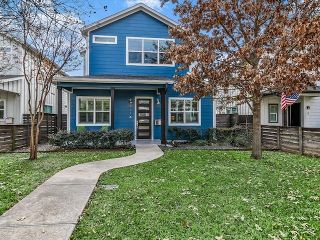 view of front of house featuring a front lawn