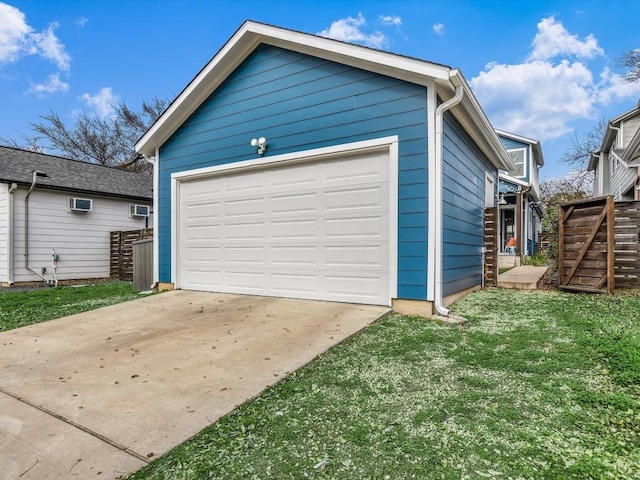 garage with a yard