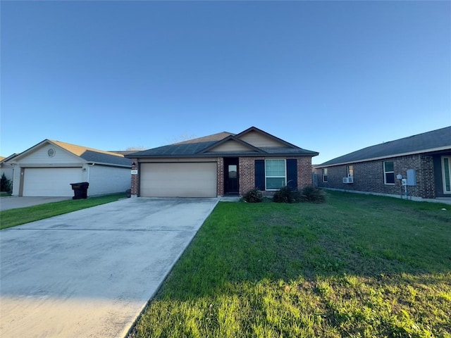 ranch-style home with a garage and a front lawn