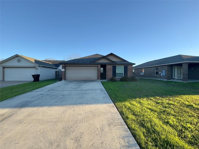 ranch-style home featuring a front yard and a garage