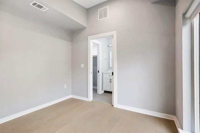 empty room featuring light hardwood / wood-style floors