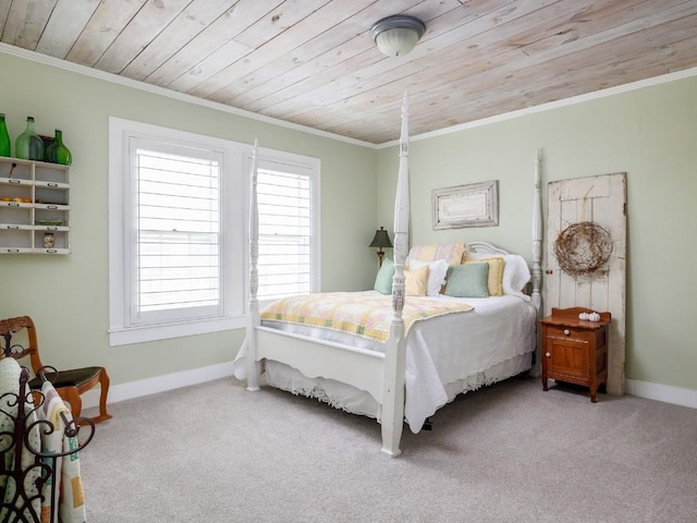 carpeted bedroom with ornamental molding and wooden ceiling