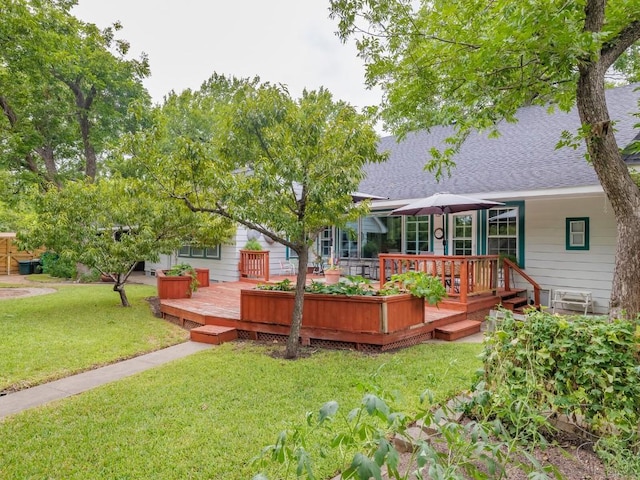 view of yard featuring a deck