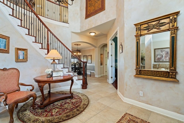 entrance foyer with a towering ceiling