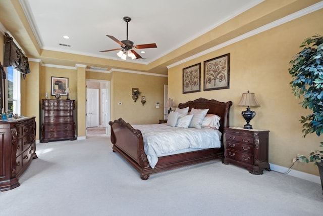 bedroom with ceiling fan, crown molding, and light colored carpet