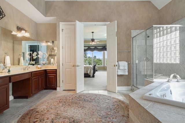 bathroom with ceiling fan, independent shower and bath, lofted ceiling, and vanity