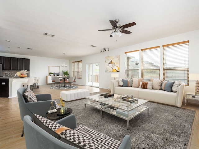 living room featuring ceiling fan