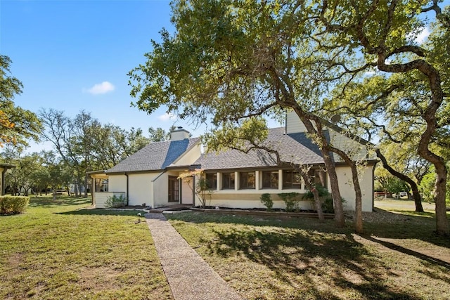 single story home with a front yard